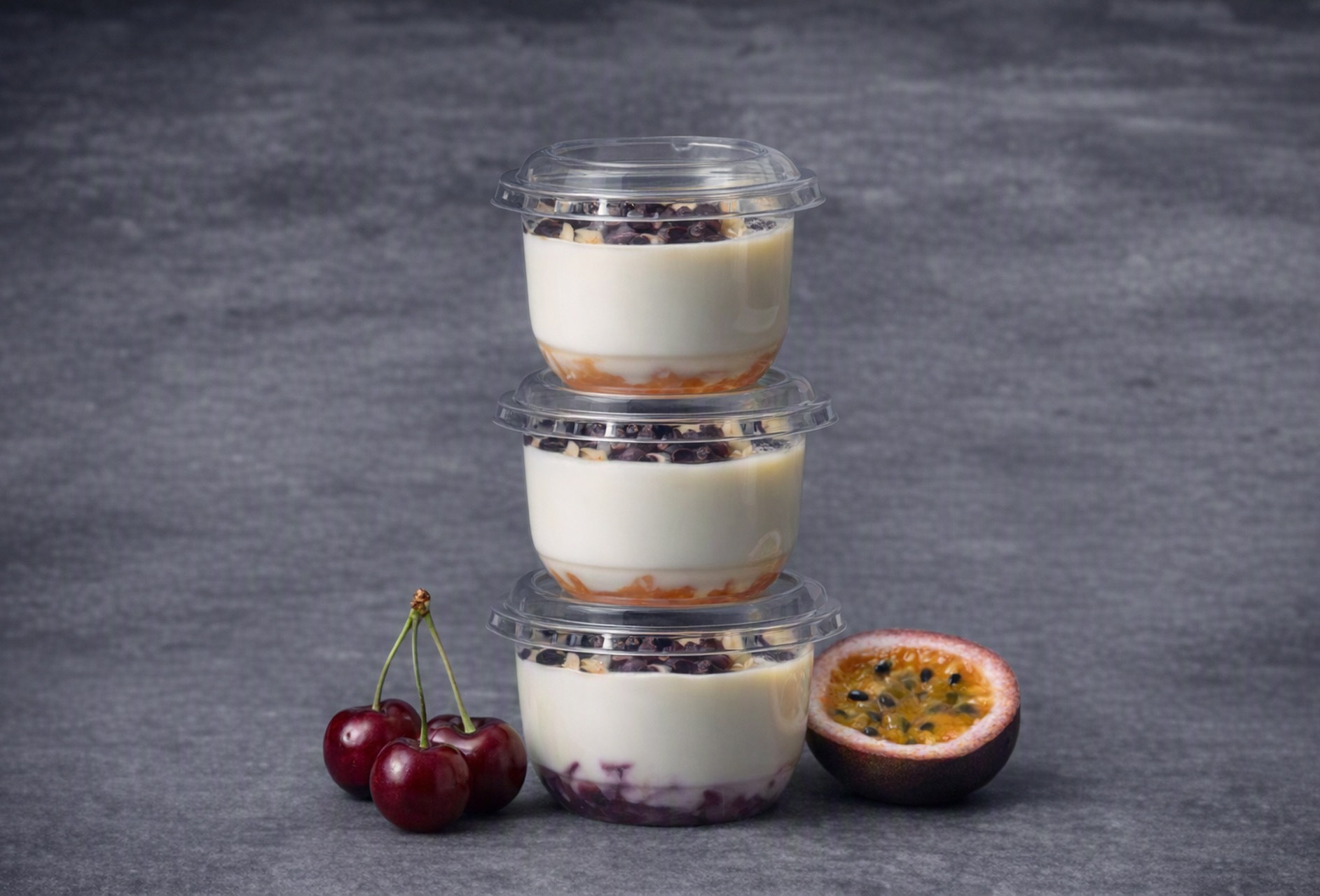 Panna cotta dessert with cherries or passion fruit