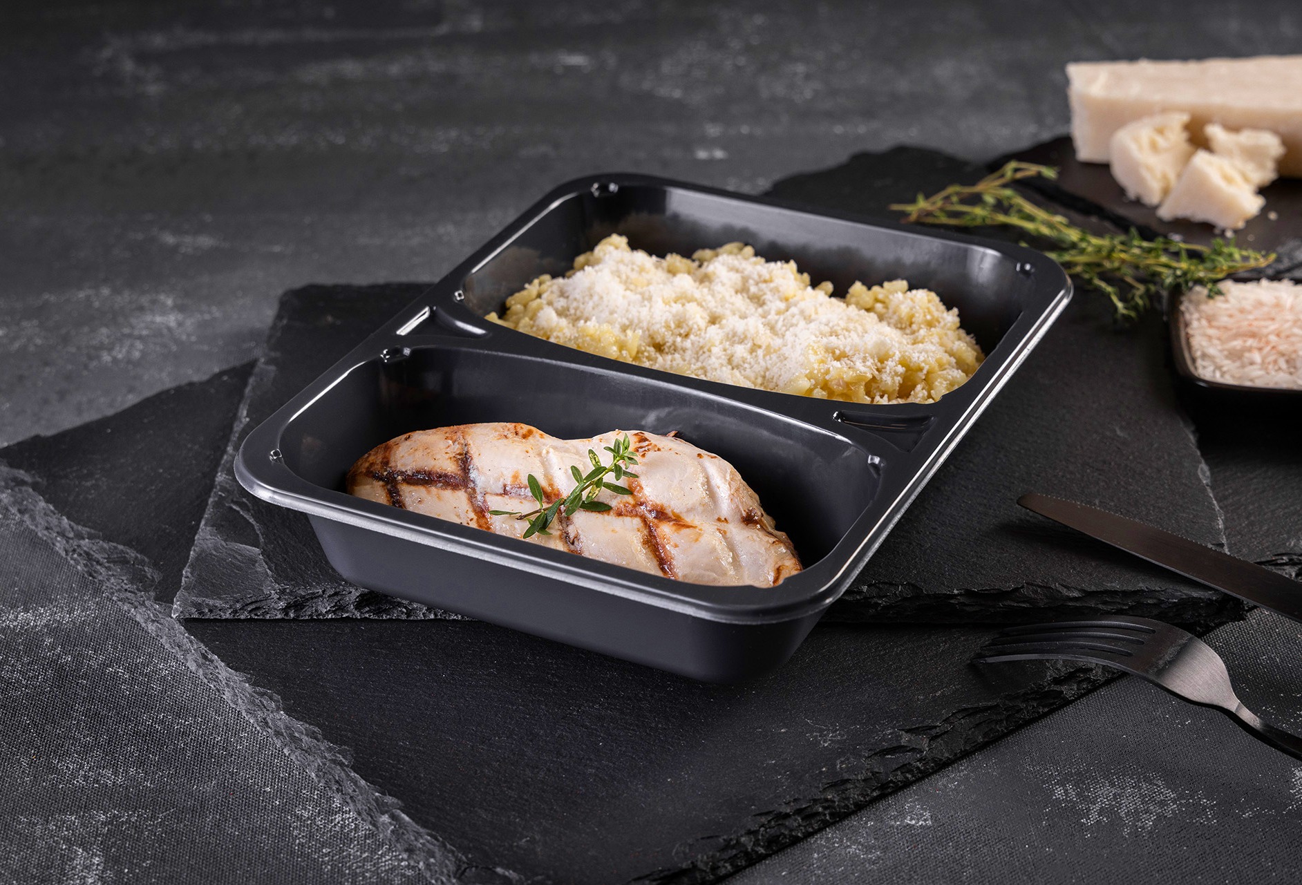 Grilled chicken breast and risotto with Parmesan